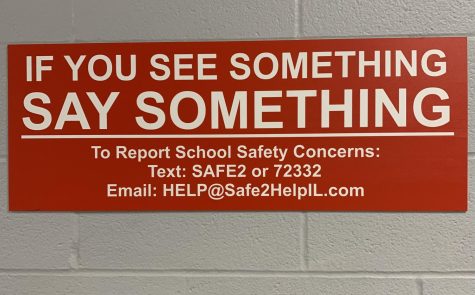 New signs were installed this year throughout the high school to give staff and students an additional opportunity to report safety concerns.